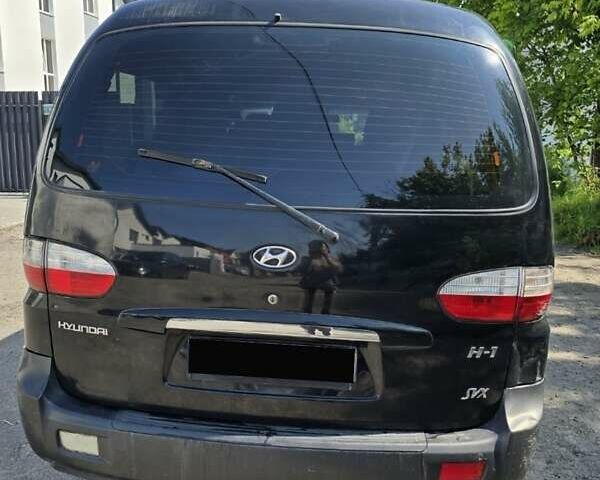 Черный Хендай H-1, объемом двигателя 2.4 л и пробегом 255 тыс. км за 8200 $, фото 9 на Automoto.ua