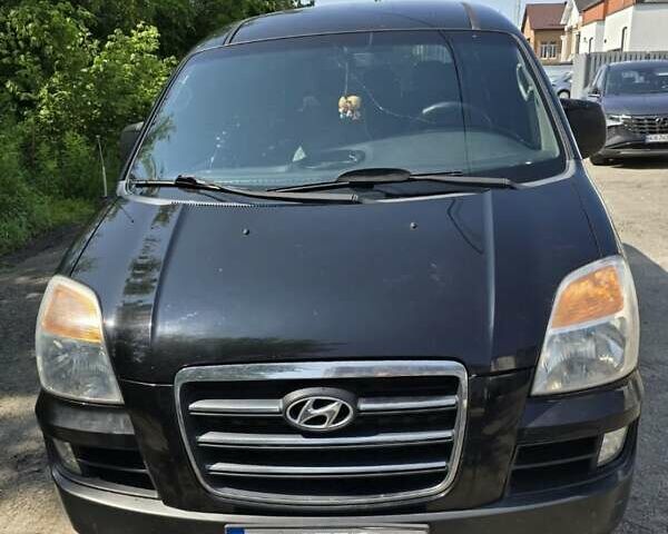 Черный Хендай H-1, объемом двигателя 2.4 л и пробегом 255 тыс. км за 8200 $, фото 12 на Automoto.ua