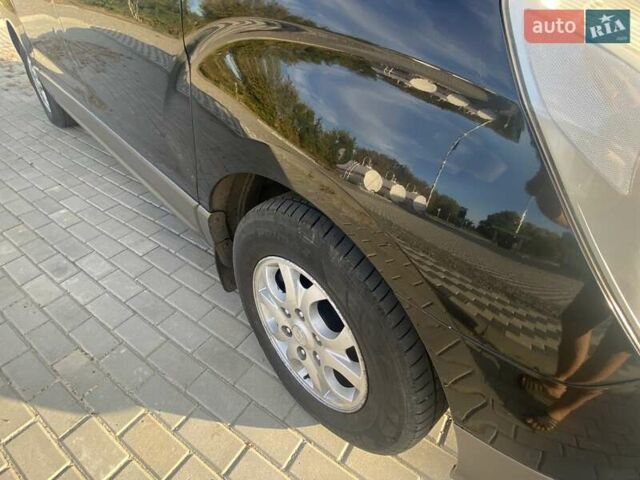 Черный Хендай H-1, объемом двигателя 2.5 л и пробегом 352 тыс. км за 12000 $, фото 7 на Automoto.ua
