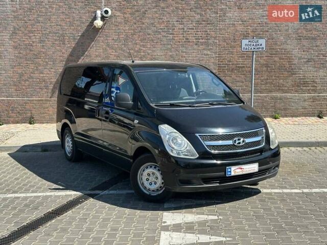 Черный Хендай H-1, объемом двигателя 2.5 л и пробегом 136 тыс. км за 11700 $, фото 4 на Automoto.ua