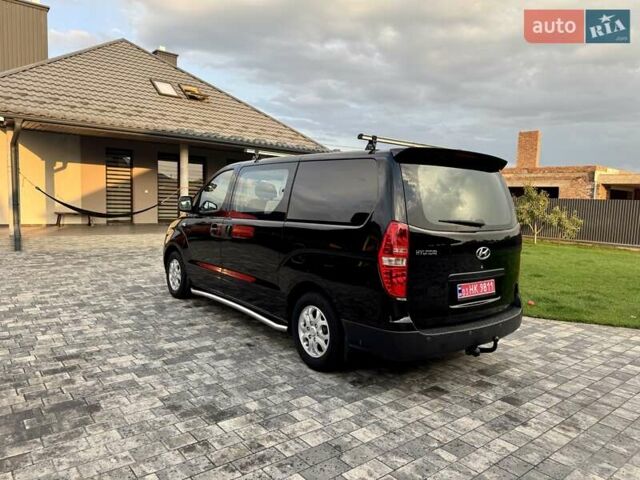 Черный Хендай H-1, объемом двигателя 2.5 л и пробегом 239 тыс. км за 12900 $, фото 10 на Automoto.ua