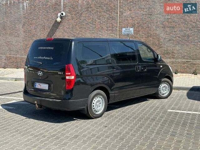 Черный Хендай H-1, объемом двигателя 2.5 л и пробегом 136 тыс. км за 11700 $, фото 12 на Automoto.ua