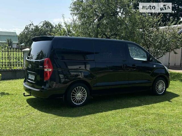 Черный Хендай H-1, объемом двигателя 2.5 л и пробегом 331 тыс. км за 14400 $, фото 3 на Automoto.ua
