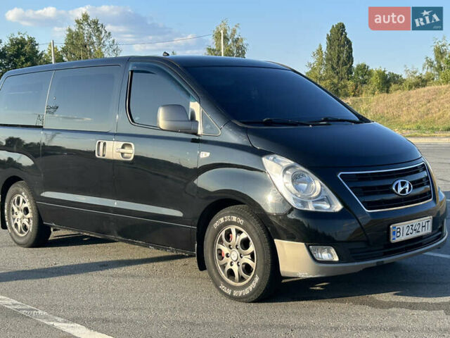 Черный Хендай H-1, объемом двигателя 2.5 л и пробегом 288 тыс. км за 16000 $, фото 4 на Automoto.ua