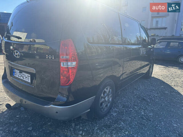 Черный Хендай H-1, объемом двигателя 2.5 л и пробегом 295 тыс. км за 15500 $, фото 2 на Automoto.ua