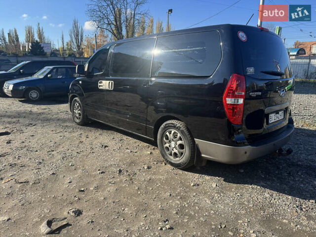Черный Хендай H-1, объемом двигателя 2.5 л и пробегом 295 тыс. км за 15500 $, фото 3 на Automoto.ua