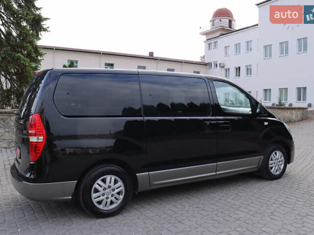 Черный Хендай H-1, объемом двигателя 2.5 л и пробегом 239 тыс. км за 17599 $, фото 12 на Automoto.ua