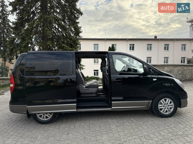 Черный Хендай H-1, объемом двигателя 2.5 л и пробегом 239 тыс. км за 17599 $, фото 61 на Automoto.ua