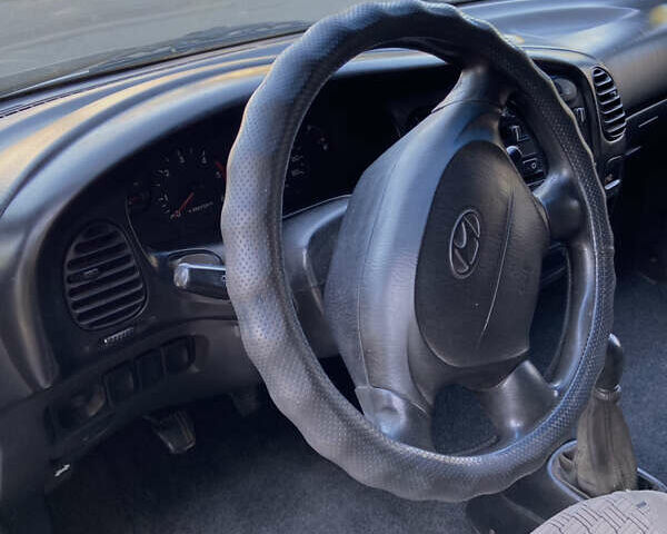 Сірий Хендай H-1, об'ємом двигуна 2.5 л та пробігом 398 тис. км за 4200 $, фото 21 на Automoto.ua