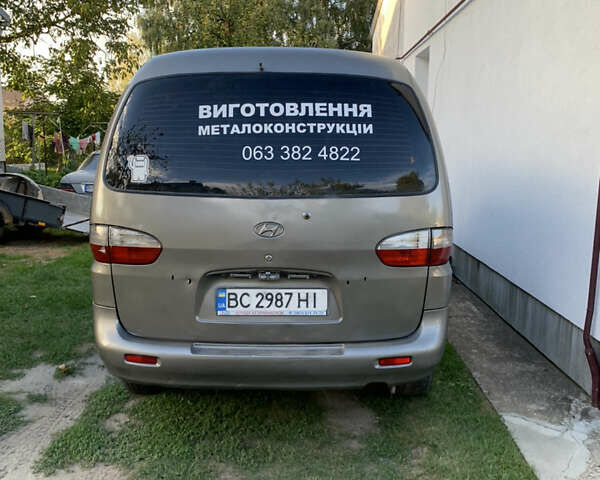 Серый Хендай H-1, объемом двигателя 2.5 л и пробегом 230 тыс. км за 5300 $, фото 2 на Automoto.ua