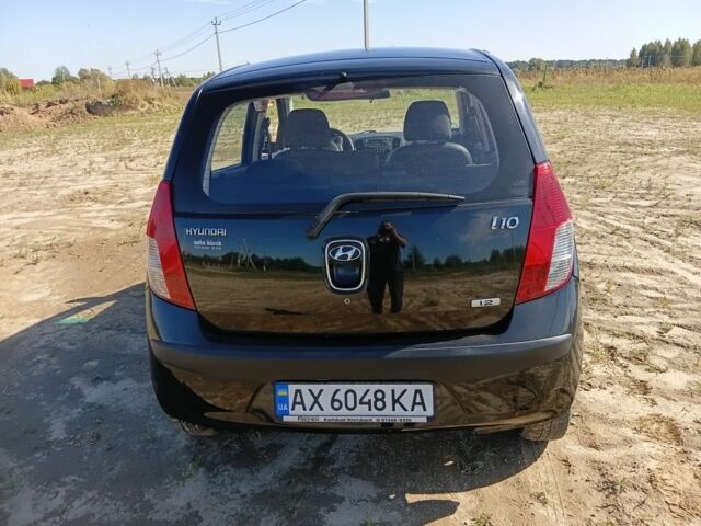 Черный Хендай и10, объемом двигателя 1.2 л и пробегом 260 тыс. км за 4300 $, фото 4 на Automoto.ua