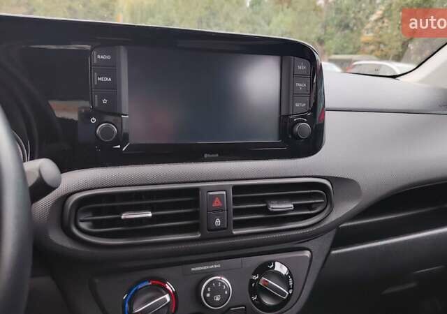 Червоний Хендай і10, об'ємом двигуна 1.2 л та пробігом 42 тис. км за 11700 $, фото 2 на Automoto.ua
