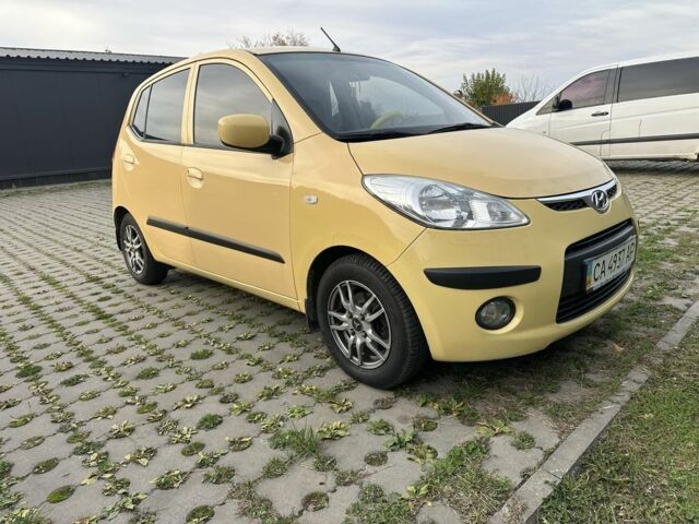 Желтый Хендай и10, объемом двигателя 1.1 л и пробегом 250 тыс. км за 5600 $, фото 5 на Automoto.ua