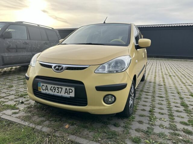 Желтый Хендай и10, объемом двигателя 1.1 л и пробегом 250 тыс. км за 5600 $, фото 7 на Automoto.ua