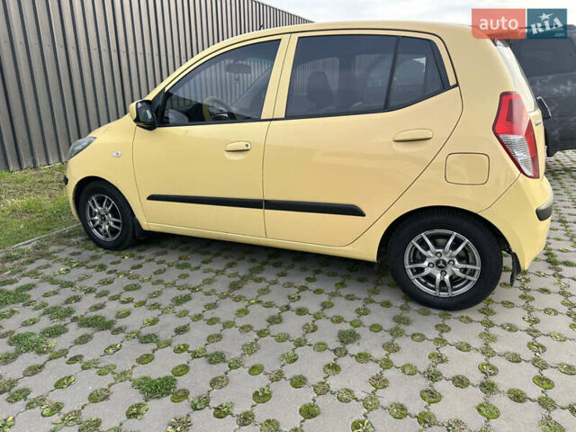 Желтый Хендай и10, объемом двигателя 1.1 л и пробегом 117 тыс. км за 5400 $, фото 12 на Automoto.ua