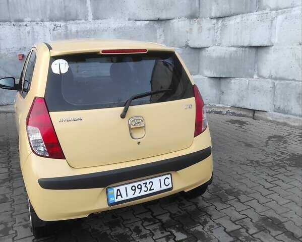 Желтый Хендай и10, объемом двигателя 1.09 л и пробегом 242 тыс. км за 5700 $, фото 2 на Automoto.ua