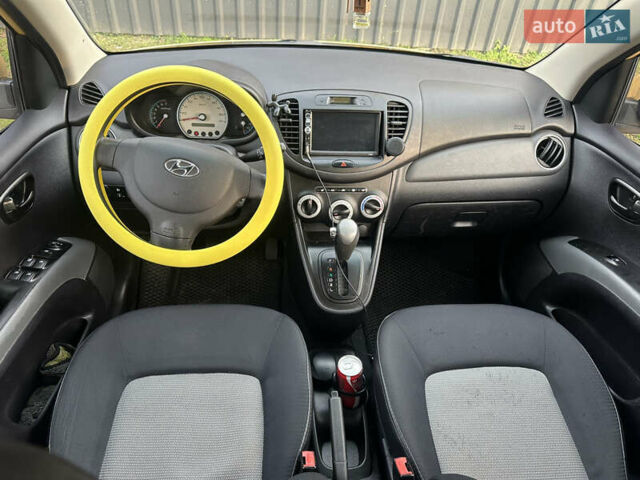 Желтый Хендай и10, объемом двигателя 1.1 л и пробегом 117 тыс. км за 5400 $, фото 7 на Automoto.ua