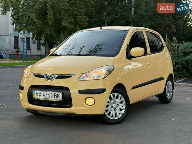 Желтый Хендай и10, объемом двигателя 1.1 л и пробегом 125 тыс. км за 6500 $, фото 1 на Automoto.ua