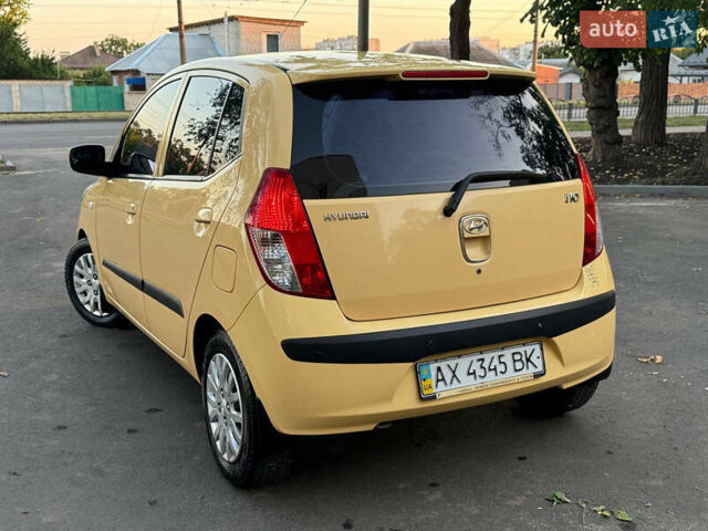 Желтый Хендай и10, объемом двигателя 1.1 л и пробегом 125 тыс. км за 6500 $, фото 9 на Automoto.ua