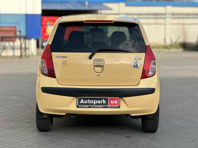 Желтый Хендай и10, объемом двигателя 1.1 л и пробегом 99 тыс. км за 6440 $, фото 5 на Automoto.ua