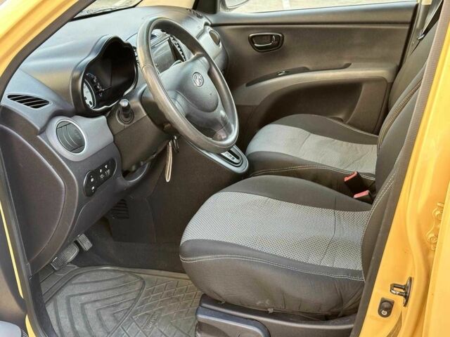 Желтый Хендай и10, объемом двигателя 1.1 л и пробегом 99 тыс. км за 6440 $, фото 7 на Automoto.ua