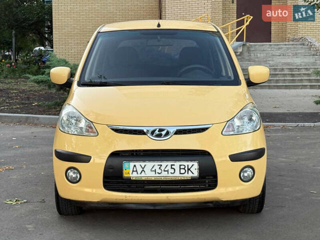 Желтый Хендай и10, объемом двигателя 1.1 л и пробегом 125 тыс. км за 6500 $, фото 2 на Automoto.ua