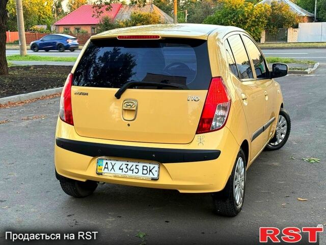Желтый Хендай и10, объемом двигателя 1.1 л и пробегом 125 тыс. км за 6500 $, фото 3 на Automoto.ua