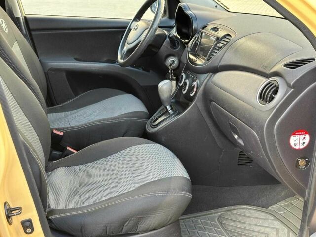 Желтый Хендай и10, объемом двигателя 1.1 л и пробегом 99 тыс. км за 6440 $, фото 18 на Automoto.ua