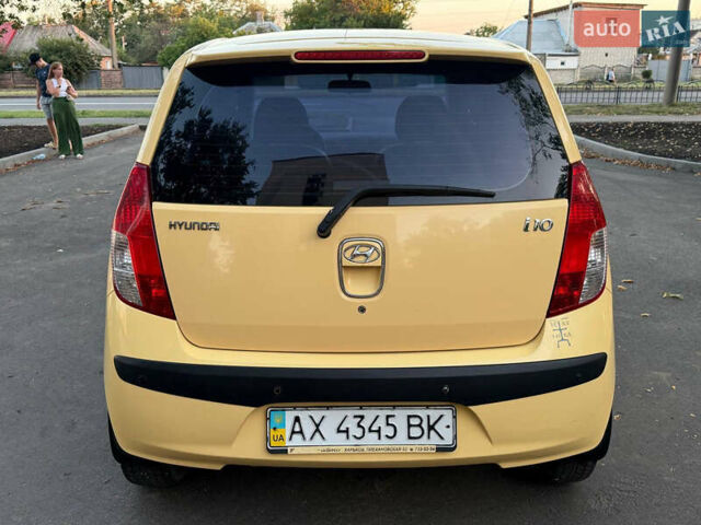 Желтый Хендай и10, объемом двигателя 1.1 л и пробегом 125 тыс. км за 6500 $, фото 8 на Automoto.ua