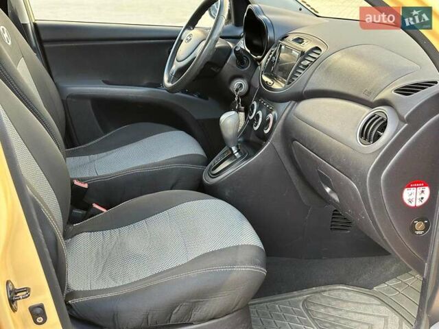 Желтый Хендай и10, объемом двигателя 1.1 л и пробегом 99 тыс. км за 6440 $, фото 18 на Automoto.ua