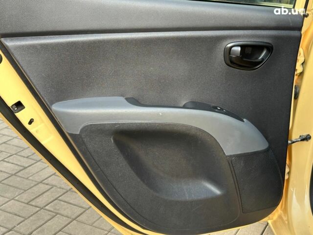 Желтый Хендай и10, объемом двигателя 1.1 л и пробегом 99 тыс. км за 6440 $, фото 12 на Automoto.ua