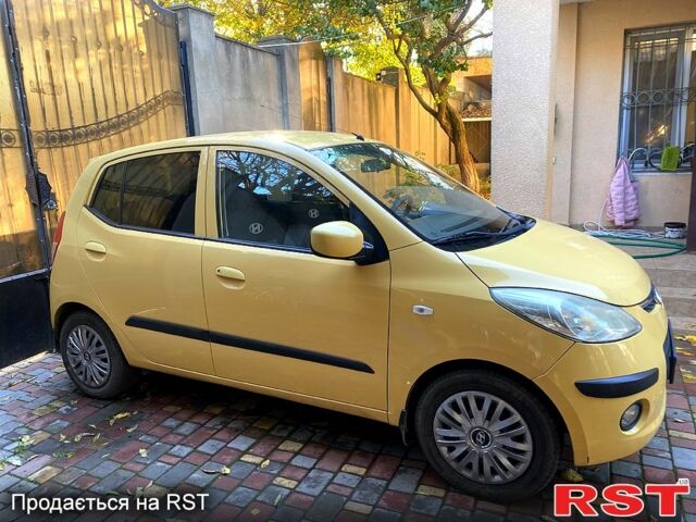 Желтый Хендай и10, объемом двигателя 1.1 л и пробегом 99 тыс. км за 6500 $, фото 2 на Automoto.ua