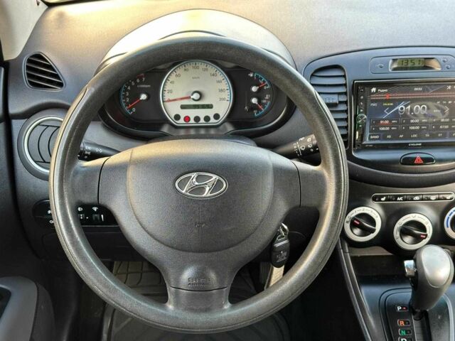 Желтый Хендай и10, объемом двигателя 1.1 л и пробегом 99 тыс. км за 6440 $, фото 15 на Automoto.ua