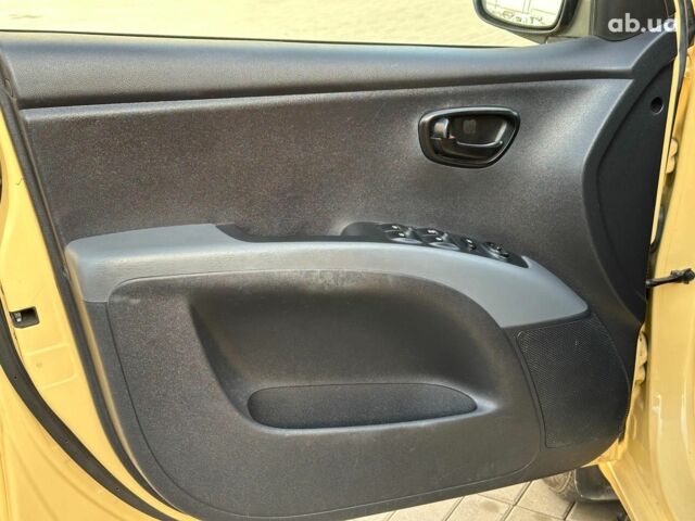 Желтый Хендай и10, объемом двигателя 1.1 л и пробегом 99 тыс. км за 6440 $, фото 8 на Automoto.ua