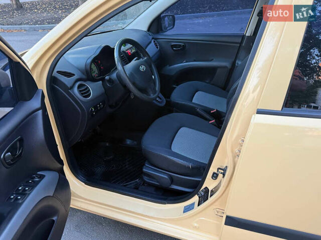 Желтый Хендай и10, объемом двигателя 1.1 л и пробегом 125 тыс. км за 6500 $, фото 14 на Automoto.ua