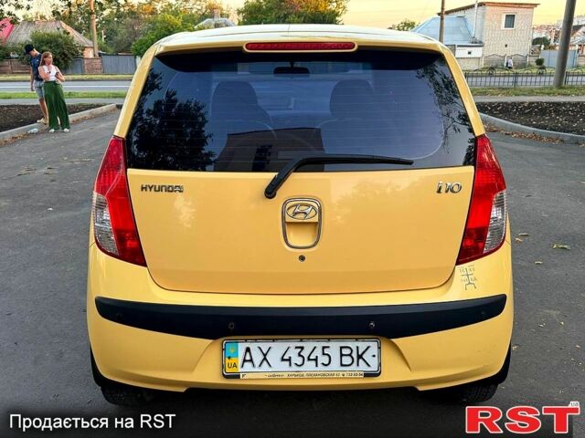 Желтый Хендай и10, объемом двигателя 1.1 л и пробегом 125 тыс. км за 6500 $, фото 2 на Automoto.ua