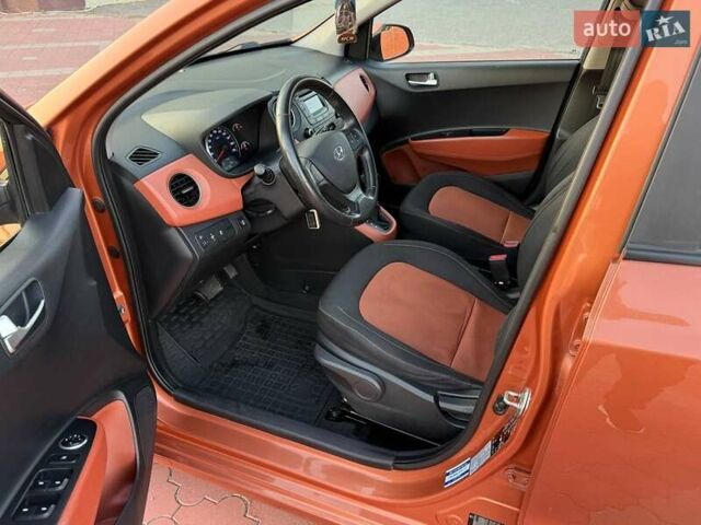 Помаранчевий Хендай і10, об'ємом двигуна 1.2 л та пробігом 150 тис. км за 7999 $, фото 13 на Automoto.ua