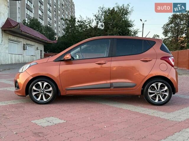 Помаранчевий Хендай і10, об'ємом двигуна 1.2 л та пробігом 150 тис. км за 7999 $, фото 4 на Automoto.ua