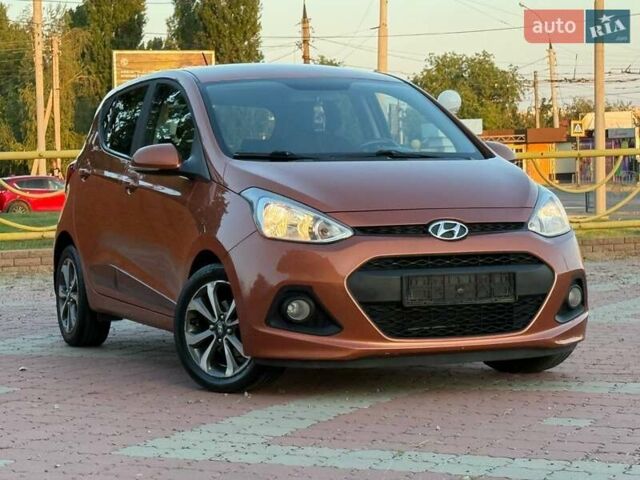 Помаранчевий Хендай і10, об'ємом двигуна 1.2 л та пробігом 150 тис. км за 7999 $, фото 10 на Automoto.ua