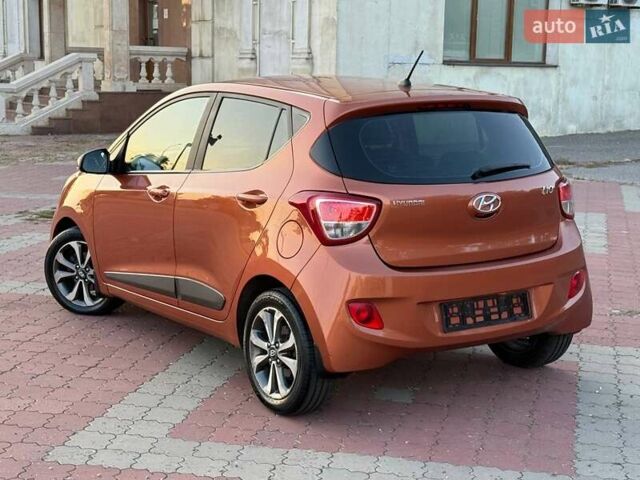 Помаранчевий Хендай і10, об'ємом двигуна 1.2 л та пробігом 150 тис. км за 7999 $, фото 5 на Automoto.ua