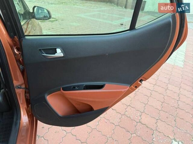 Помаранчевий Хендай і10, об'ємом двигуна 1.2 л та пробігом 150 тис. км за 7999 $, фото 22 на Automoto.ua