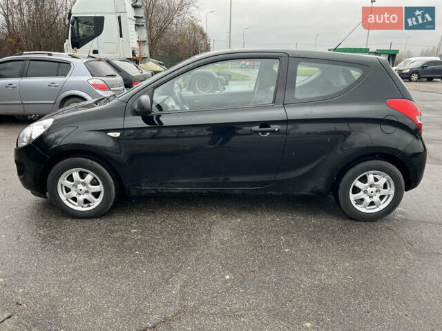 Черный Хендай и20, объемом двигателя 1.25 л и пробегом 165 тыс. км за 5100 $, фото 1 на Automoto.ua