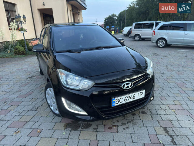 Черный Хендай и20, объемом двигателя 1.12 л и пробегом 298 тыс. км за 4999 $, фото 1 на Automoto.ua