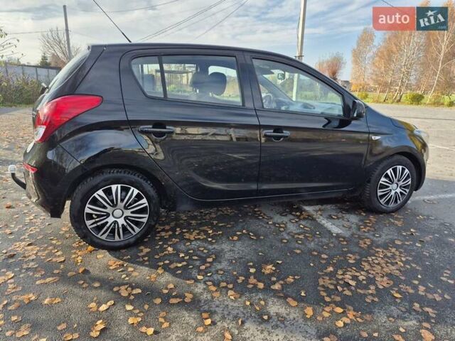 Черный Хендай и20, объемом двигателя 1.4 л и пробегом 224 тыс. км за 5950 $, фото 10 на Automoto.ua