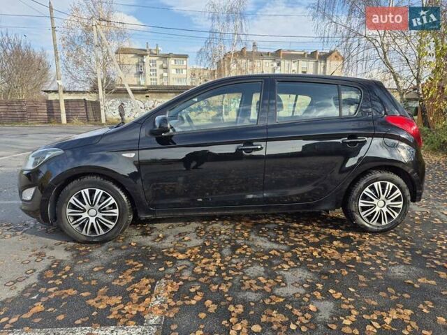 Черный Хендай и20, объемом двигателя 1.4 л и пробегом 224 тыс. км за 5950 $, фото 4 на Automoto.ua