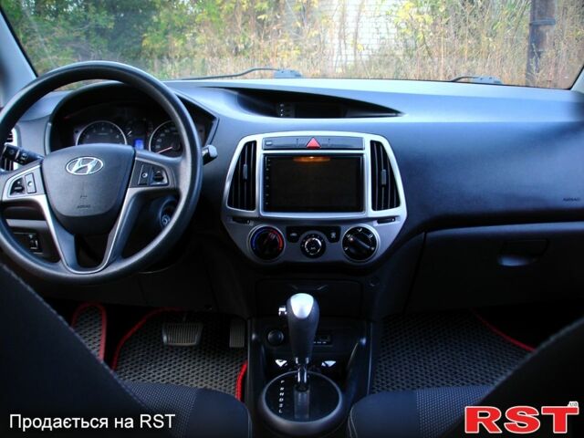 Красный Хендай и20, объемом двигателя 1.4 л и пробегом 116 тыс. км за 7700 $, фото 7 на Automoto.ua