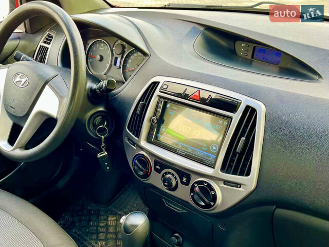 Красный Хендай и20, объемом двигателя 1.4 л и пробегом 159 тыс. км за 8450 $, фото 38 на Automoto.ua