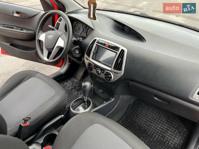 Червоний Хендай і20, об'ємом двигуна 1.4 л та пробігом 159 тис. км за 8300 $, фото 17 на Automoto.ua