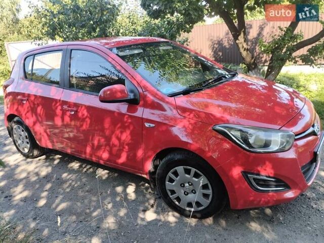 Красный Хендай и20, объемом двигателя 1.4 л и пробегом 159 тыс. км за 7500 $, фото 10 на Automoto.ua
