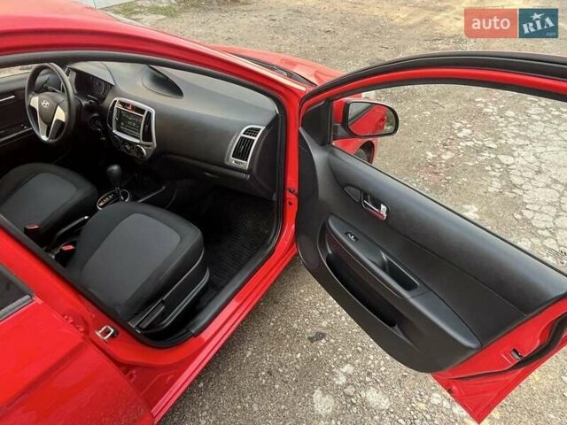 Красный Хендай и20, объемом двигателя 1.4 л и пробегом 159 тыс. км за 8850 $, фото 13 на Automoto.ua